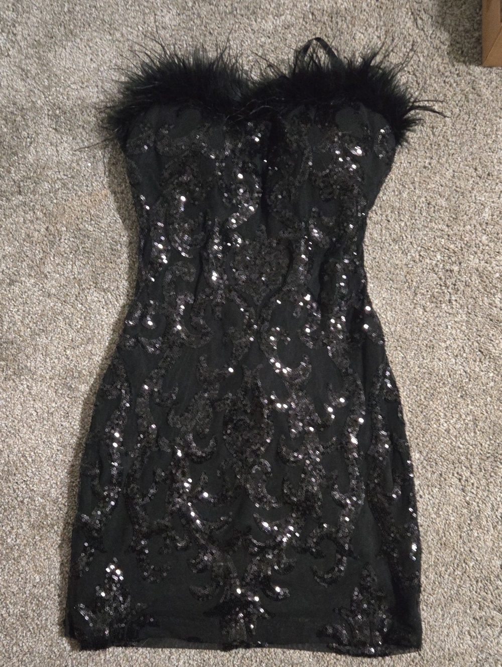 B. Darlin strapless black mini dress sequins and a plush Feather